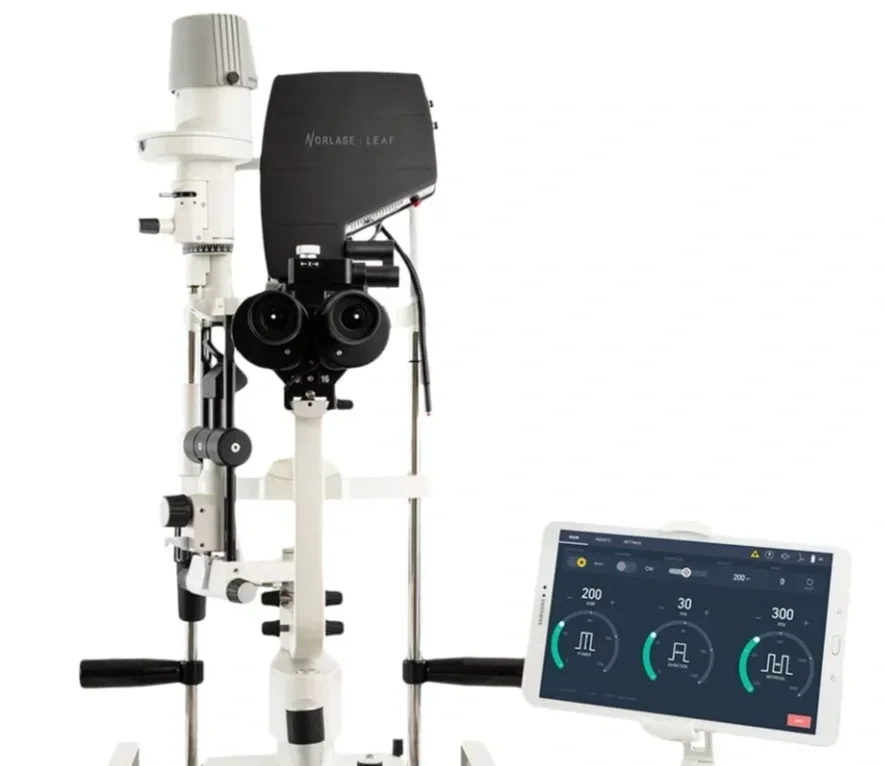 Photocoagulator GUI cover: the Norlase laser slit lamp device with a tablet mounted beside it running the treatment GUI, showing power, duration, and interval dials.